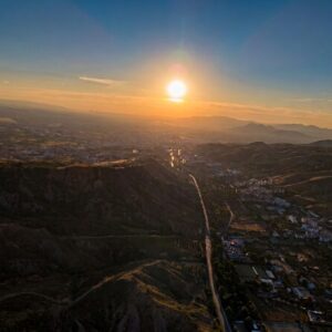 Sunset over the Granada valley seen from a paraglider