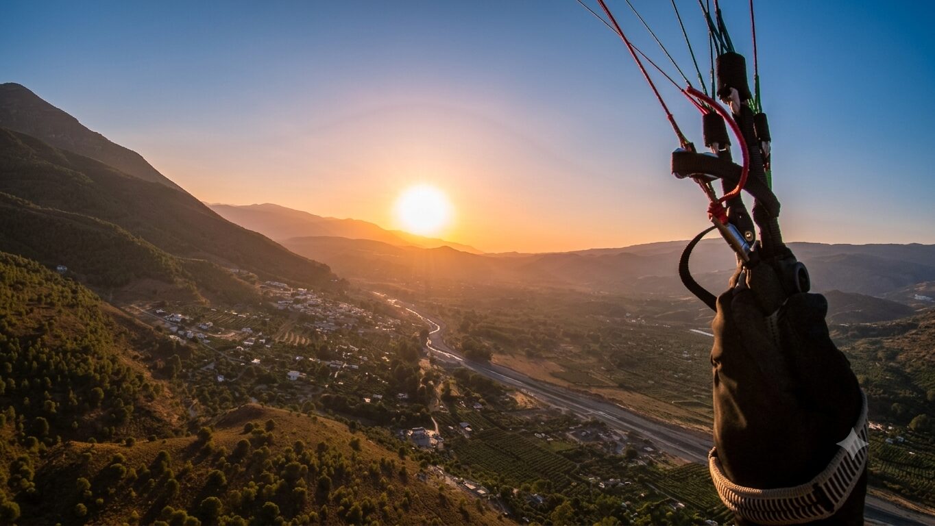 Sunset Flight 6 Pilot’s view of the sunset during a tandem paragliding flight